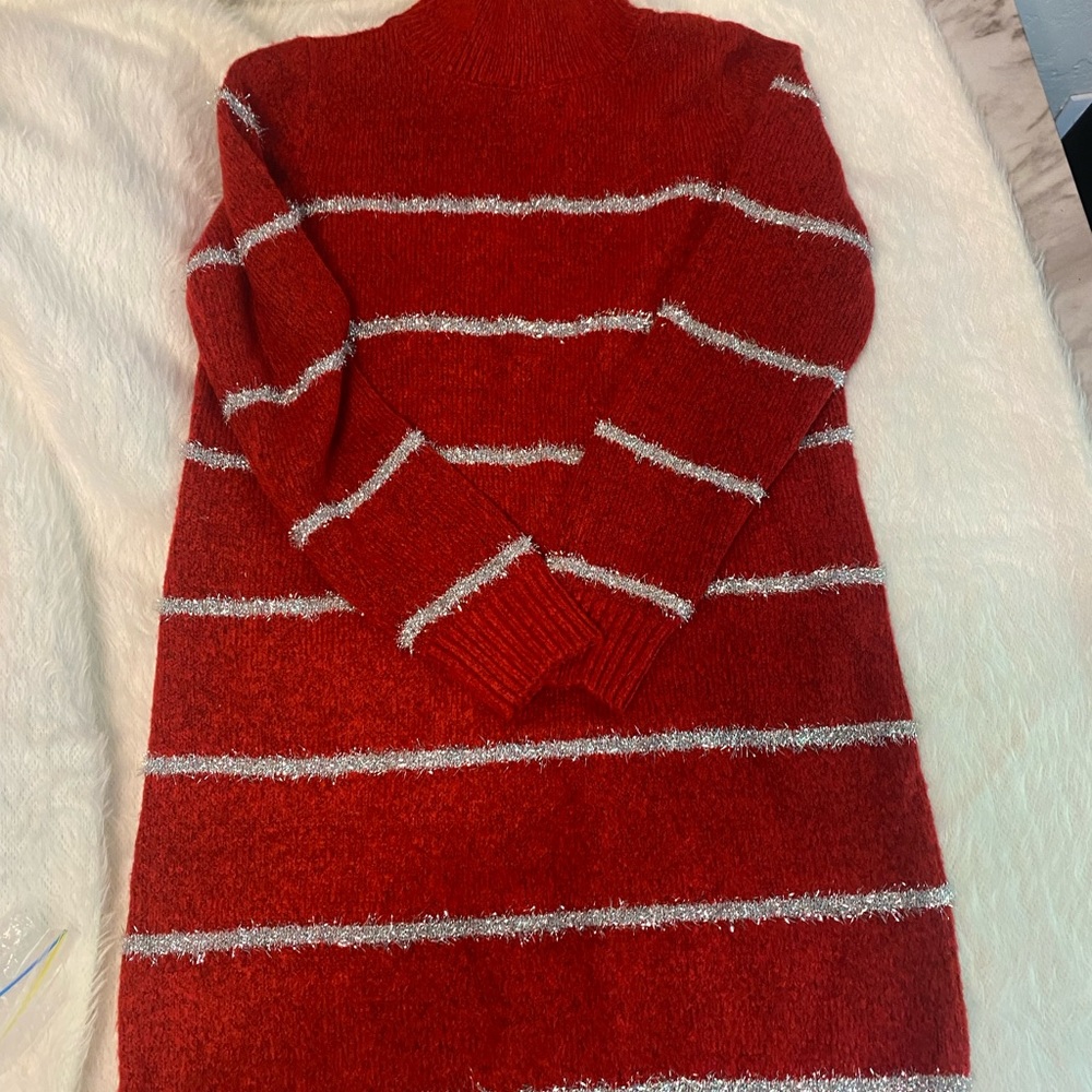 **Brand New Christmas sweater size medium. Long, perfect to wear with leggings!